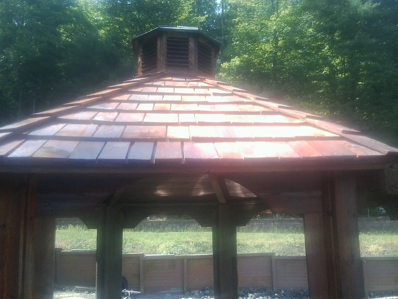 New cedar shake roof and cupola on a lakeside gazebo in Conneaut Lake