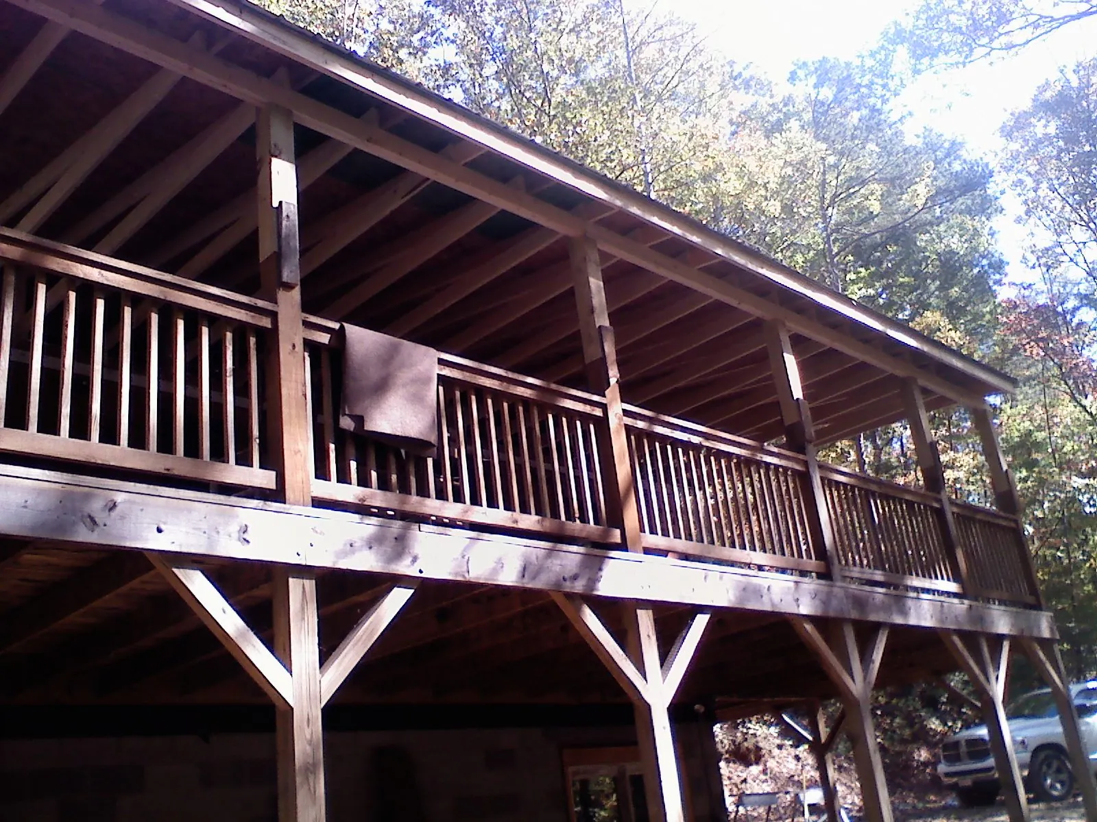 Timber framing under a new elevated porch and deck — Roof Leak Repair in Conneaut Lake by Roofing Brothers